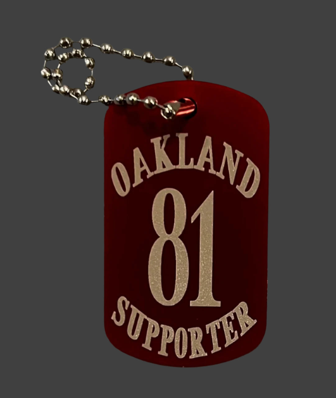 Support Oakland dog tag keychain