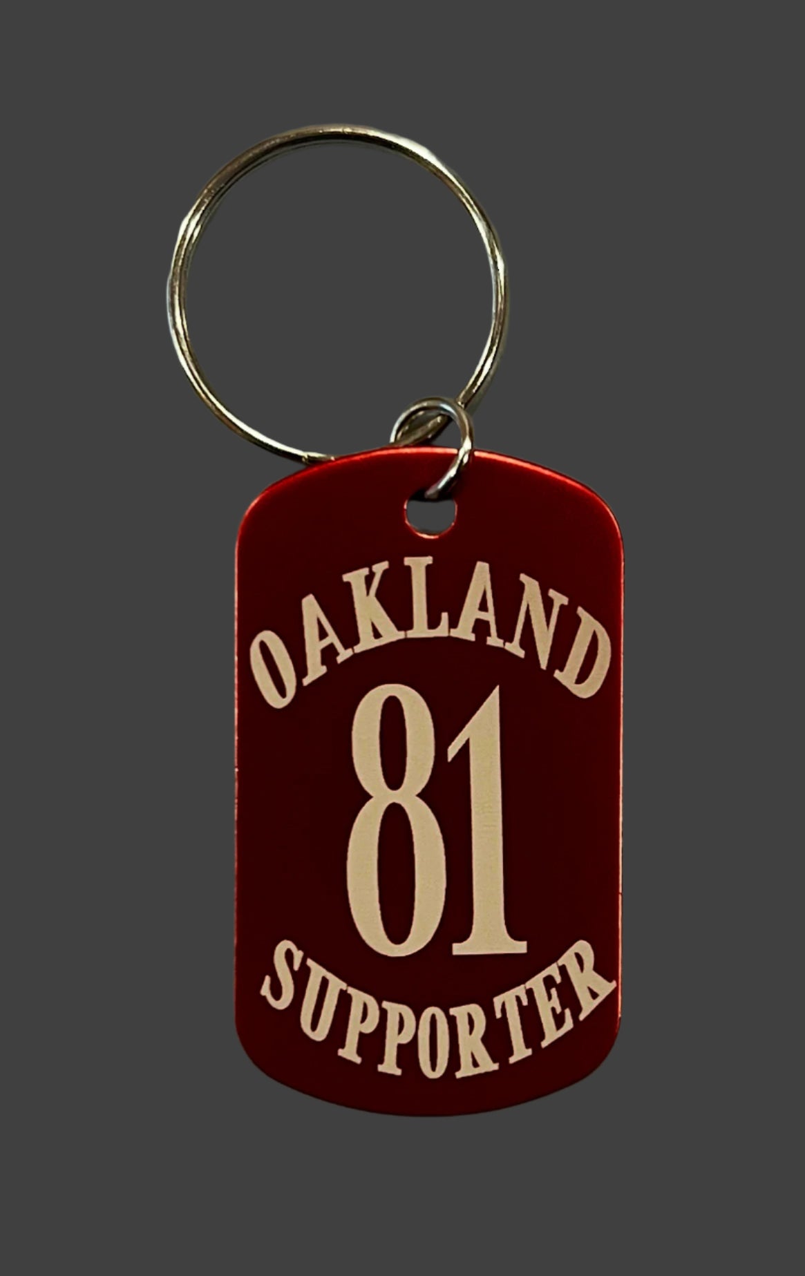 Support Oakland dog tag keychain